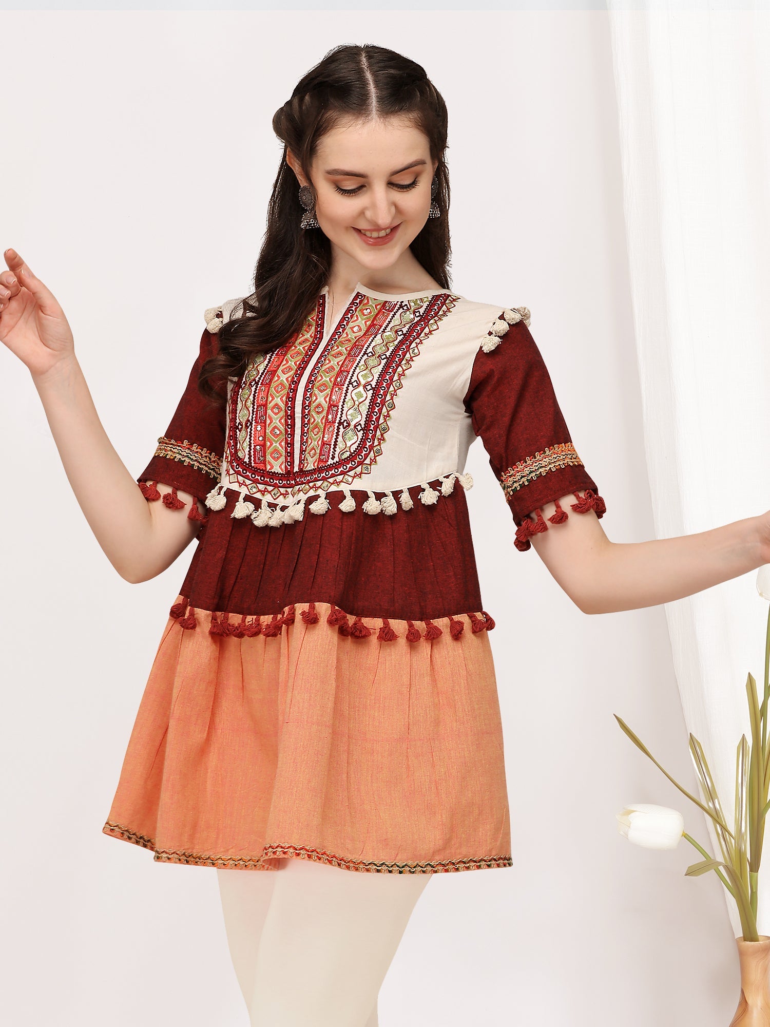 Cute off-white and peach embroidered long kedia top