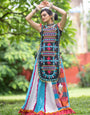 Black geometric motif embroidered panel top paired with colorful flairy skirt